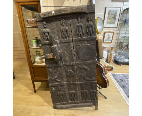 Tribal African Art. Original Dogon Granary Door With typical sliding lock Carving depicts typical images of sun lizards and a