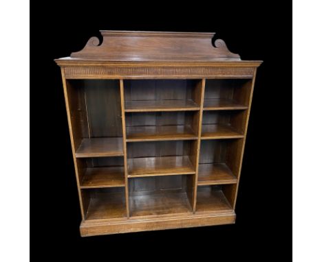 A Modern Oak Framed Adjustable Shelf Bookcase  Height to top of unit (not including back board): 142 cms approx. Width: 137 c