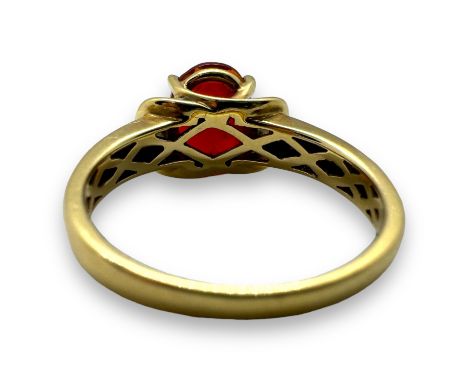AWAY A suite of fire opal and diamond set jewellery in 18ct yellow gold.
Featuring a fire opal and diamond ring, set with a c