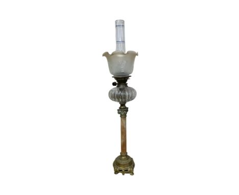 Vintage Brass Mounted and Alabaster Oil Lamp Raised on 4 lion feet. With unassociated shade. Total height (with funnel):  88 