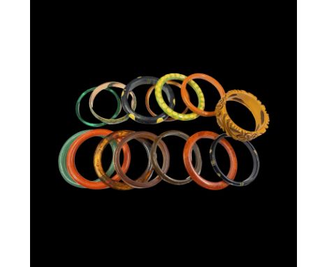 Selection of vintage 14 bangles to include several carved bakelite bangles,  a Renoir/ Mattisse signed copper and enamel bang