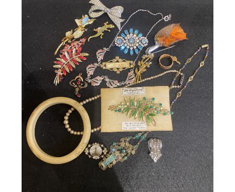 Mixed lot of costume Jewellery including Brooches and necklaces and a 9ct gold Edwardian style pendant which is 1.7gms approx