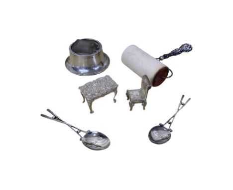 A mixed lot of silver: dolls house furniture, an ink blotter and stamp roller, plus a pair of spoons  A dolls house miniature