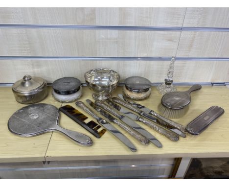 A mixed lot of silver items; to include a James Dixon silver sugar bowl, Sheffield 1905, 129g, a six piece dressing table van