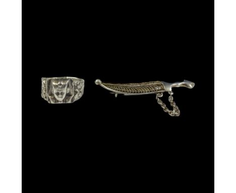 Vintage unmarked white metal (Jambiya) dagger brooch and silver Pharoah ring.