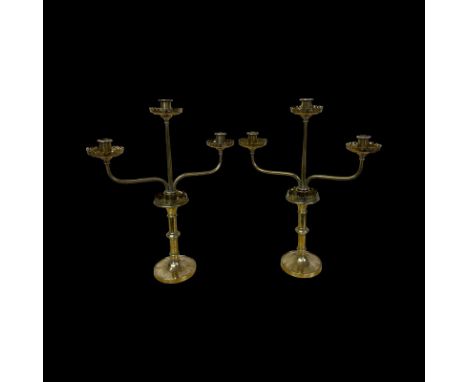A Pair of Early 19th Century Metamorphic Brass Ecclesiastical Candlesticks. The candelabra arm removes to leave a single cand