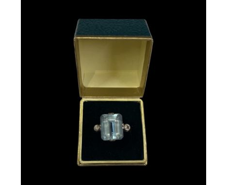 An Art Deco circa 1930 platinum, aquamarine (7ct approx.) and diamond ring   The emerald cut aquamarine is approximately 7ct 