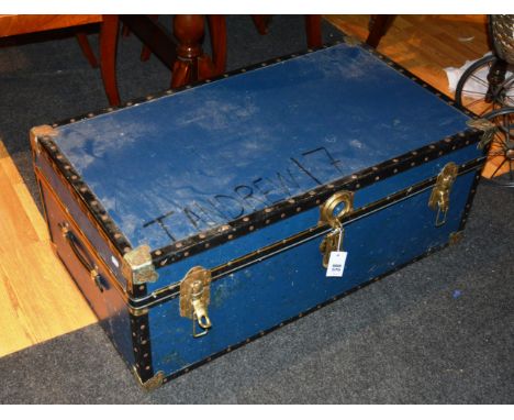 A vintage metal bound travel trunk, with hinged lid, 37cm high x 91cm wide