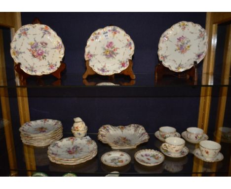 Twelve early 20th century similar Dresden porcelain fruit plates, also with similar comport and four saucers with two cups, d