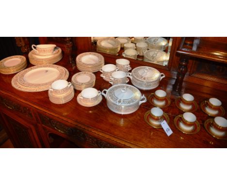 A Royal Worcester Hyde Park pattern dinner set, decorated with gilded urn and foliate border on white ground (56), together w