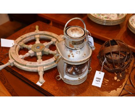 A whaling gimble lamp, from South Georgia, including a mast lamp and a small ships wheel (3)
