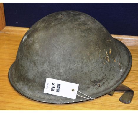 A World War II army steel helmet, 31cm diameter