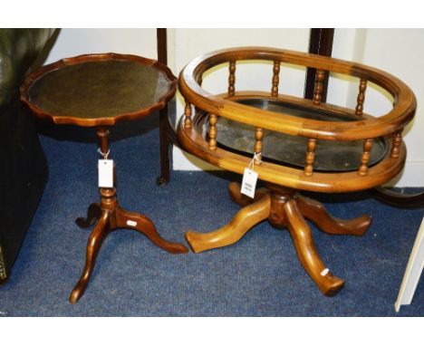 A reproduction Victorian style hardwood planter/occasional table, with turned balustrade supports, raised on quad splayed sup