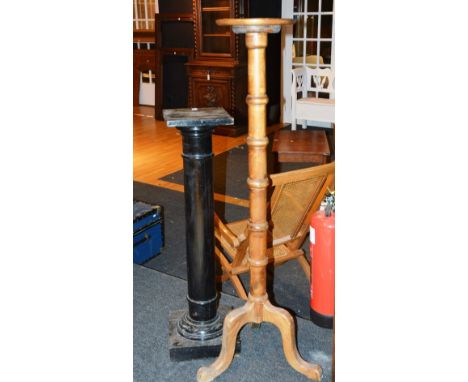 A stained pine torchere, with faux bamboo column, ending in tripod base, 145cm high, together with an ebonised plant pedestal