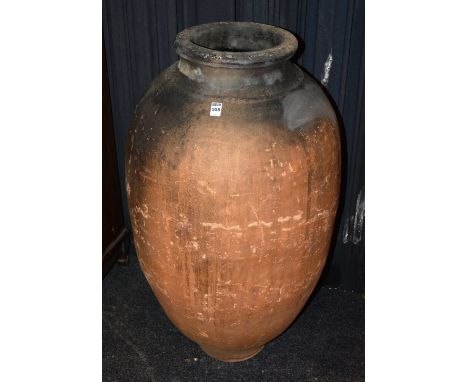 A large blue glazed earthenware planter/pot, 35cm high x 55cm diameter