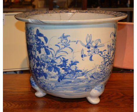 A large Oriental 19th century hand painted pottery planter, decorated with blue coloured birds in foliage (a/f) 37cm high x 4