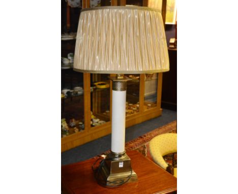 A modern table lamp with shade, raised on cylinder column, with silvered decoration, 89cm high