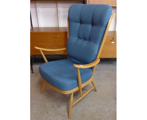 An Ercol Evergreen Blonde armchair 