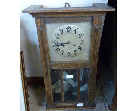 An oak wall clock 