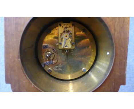 An Edward VII inlaid mahogany mantel clock