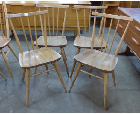 A set of four Ercol elm and beech 391 model chairs 