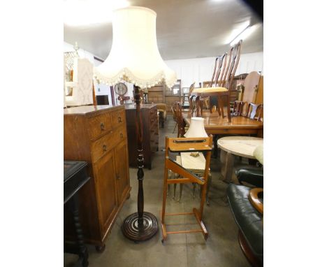 A beech standard lamp and a gentleman's valet stand 