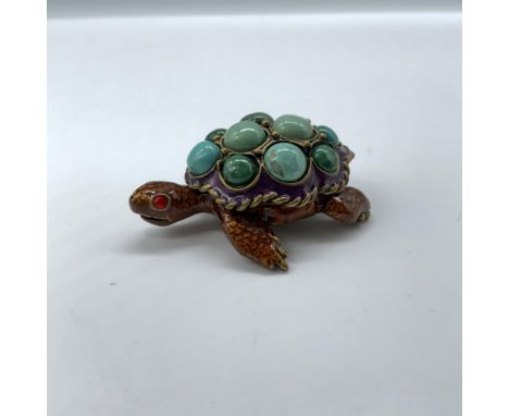 Beautiful tiny turtle trinket box with enamel and semi-precious stones. Jay Strongwater stamp on the bottom. Dimensions: 1.75