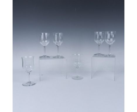 Stunning tall crystal wine glasses in the Capri pattern with elaborate cut star motif with elegant stem. Baccarat etched mark