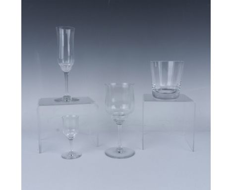 Clear crystal drinkware with smooth vertical lines. The collection includes a lowball glass, a cordial glass, a champagne flu