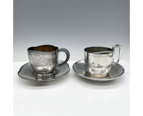 Sets include engraved cups 4.75"L x 3"W x 3.5"H with floral and bird designs with matching saucers 6" dia.. Pelton &amp; Raci