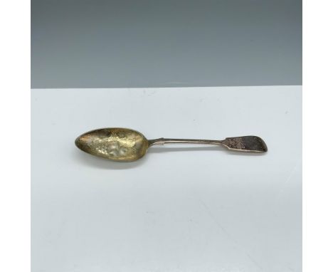 Ornate utensil with a fruit design in the bowl and a floral design on the handle. WP marking on the back. Dimensions: 8.75"L 