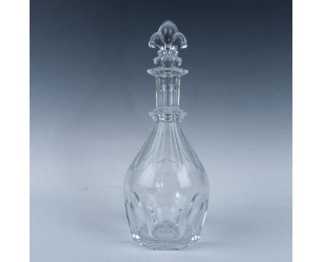 Gorgeous thick crystal decanter with a beautiful stopper, featuring both concave and convex cuts on the body, a repeated hept