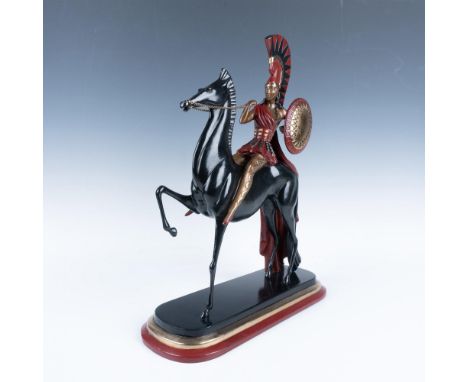 A stunning limited edition Art Deco bronze sculpture depicts a graceful female Amazonian warrior in striking red and black ar