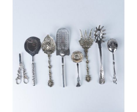 Elegant collection of assorted silverplated utensils that includes an Italian cake cutter as well as a fork and spoon for sal