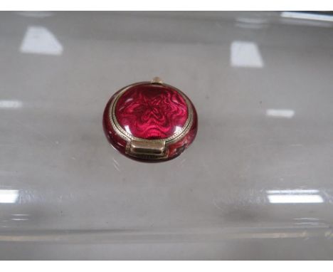 An antique Russian silver and guilloche enamel pill box 