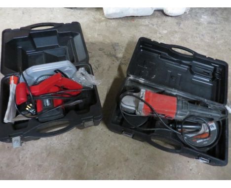 A cased Champion circular saw and a cased angle grinder 