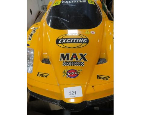 A large 1:8 scale of a Ferrari (remote not included) 