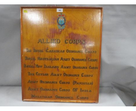A vintage wooden sign commemorating the Allied corps, Royal Canadian ordnance corps, Royal Australian army corps, Royal New Z