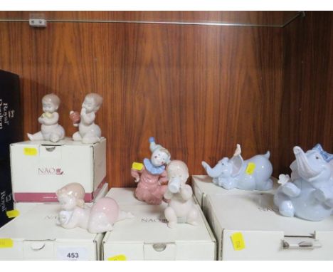 Seven pieces of Nao in original boxes to include two playful elephants 