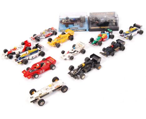 A collection of 13x loose &amp; boxed 1/32 scale Scalextric plastic Formula One racing slot cars to include; Mercedes, Honda,