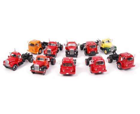 A collection of 10x First Gear American made 1:34 scale Mack Trucks diecast model lorry cabs. Various liveries, to include; H