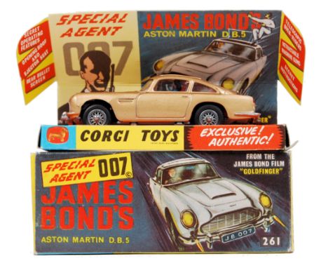 A rare ex-shop-stock Corgi Toys diecast model No. 261 James Bond 007 Aston Martin DB5. The model being very near mint in cond