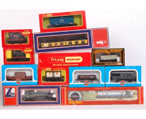 A collection of assorted boxed 00 gauge railway trainset rolling stock items. All boxed. To include; Mainline, Lima, Airfix, 