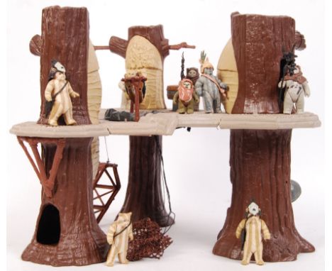 An original vintage Palitoy / Kenner made Star Wars action figure playset ' Ewok Village .' Unboxed. Comes with an assortment