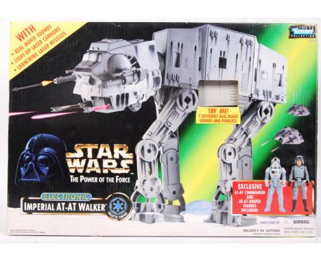 A Kenner Collection made Star Wars action figure playset Electronic ' Imperial AT AT Walker .' Within the original box. Vendo