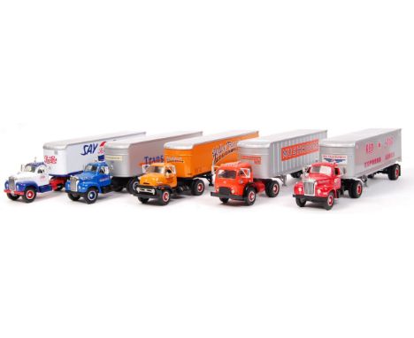 A collection of 5x American made First Gear 1:34 scale precision diecast model lorries / Mack trucks. All haulage related. To