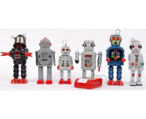 A rare set of 6x Ditto Reproductions made ceramic ' Robots '. Each modelled after a classic tinplate toy robot. c1984.&nbsp;A