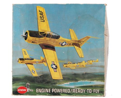 A rare vintage Cox made T-28 ' Engine Powered Ready To Fly ' Advanced Trainer model aircraft. Appears in remarkable condition