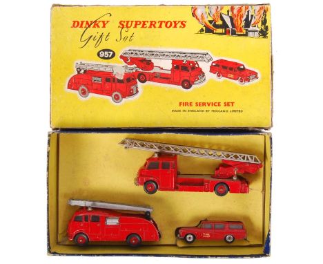 An original rare vintage Dinky Supertoys Gift Set No. 957 ' Fire Service Set .' Comprising of; 955 Fire Engine With Extending