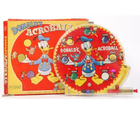 An original vintage Marx Toys made Walt Disney Productions ' Donald's Acroball Game .' Tinplate and plastic construction, in 